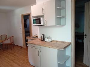 Cucina o angolo cottura di Liget Üdülőpark Fonyód