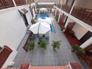 Bazén v ubytování Luang Prabang Pavilion Hotel & Travel nebo v jeho okolí