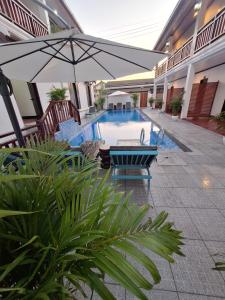 Bazén v ubytování Luang Prabang Pavilion Hotel & Travel nebo v jeho okolí
