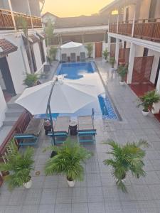 Bazén v ubytování Luang Prabang Pavilion Hotel & Travel nebo v jeho okolí