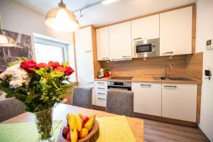 Η κουζίνα ή μικρή κουζίνα στο Appartement Gimpl