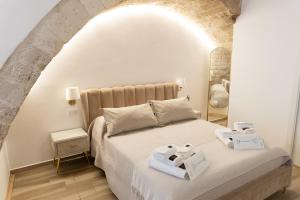 Ένα ή περισσότερα κρεβάτια σε δωμάτιο στο Carola Luxury Room