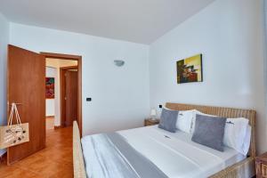 Postel nebo postele na pokoji v ubytování Patio Antigo Residence + 31 fotografií