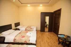 Postel nebo postele na pokoji v ubytování Hotel 4You