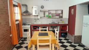 Kuchyň nebo kuchyňský kout v ubytování Departamentos Flor de Loto