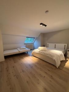 Postel nebo postele na pokoji v ubytování 't Urbain - Vakantiewoning + 19 fotografií