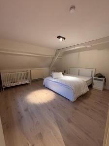 Postel nebo postele na pokoji v ubytování 't Urbain - Vakantiewoning