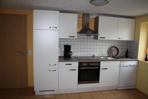 Kjøkken eller kjøkkenkrok på Ferienwohnung Peerenboomshof