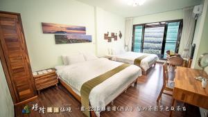 Letto o letti in una camera di 璟隆慢活仙境民宿