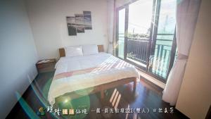 Letto o letti in una camera di 璟隆慢活仙境民宿