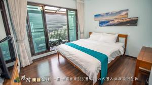 Letto o letti in una camera di 璟隆慢活仙境民宿