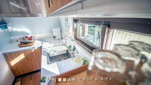 Cucina o angolo cottura di 璟隆慢活仙境民宿