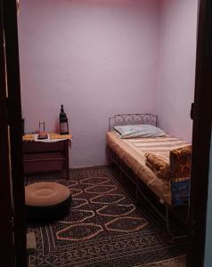 Katil atau katil-katil dalam bilik di Adil Guest House