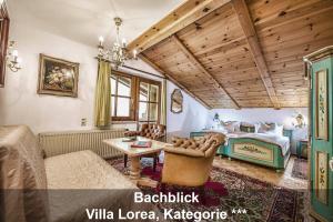 Uma área de estar em Schloss Hotel Fernsteinsee