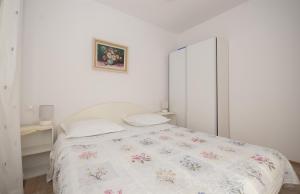 Posteľ alebo postele v izbe v ubytovaní Apartment Tom
