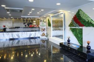 The lobby or reception area at The Hera Platinum Hotel