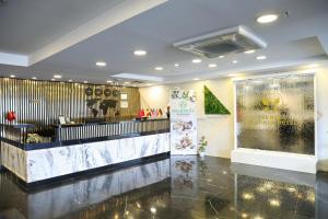 The lobby or reception area at The Hera Platinum Hotel