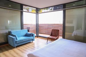 A bed or beds in a room at The Hera Platinum Hotel Még 37 kép