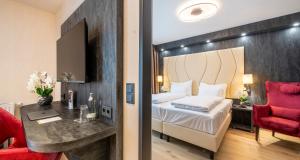 Postel nebo postele na pokoji v ubytování PLAZA Residence Wiener Neustadt