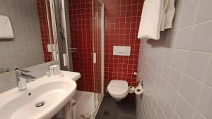 Um banheiro em Hotel International & Terminus