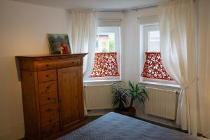 Postel nebo postele na pokoji v ubytování Ferienwohnung Eifel-Nest