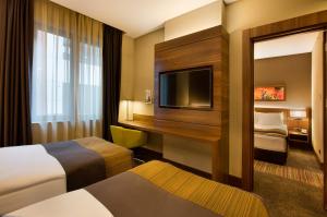 Postel nebo postele na pokoji v ubytování Holiday Inn Istanbul - Kadikoy by IHG + 37 fotografií