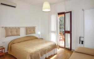 Postel nebo postele na pokoji v ubytování Awesome Home In Santa Croce Camerina