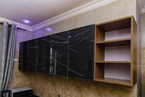 Ένα μπάνιο στο Residence Kahasha Nicolas RKN