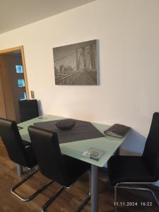 a conference room with a table and chairs at Haus Nuhn in Bad Wildungen