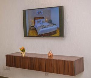 เตียงในห้องที่ Blue Orange Hotel and Towers