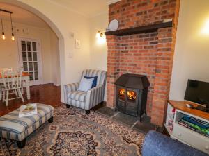 Χώρος καθιστικού στο Betty's Farm Cottage