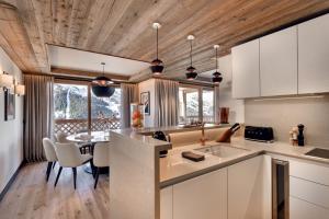 Kuchyň nebo kuchyňský kout v ubytování Antarès STELLA 101 - Spacious ski inski out apartment