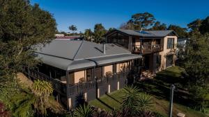 an aerial view of a house with a roof at The Agave in Currarong