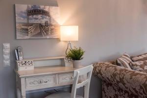 Posezení v ubytování Villa Hansa Binz App 4 am Kurpark Meine Ferienzeit