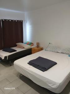 Posteľ alebo postele v izbe v ubytovaní Appartement Almadrava Roses + 37 fotografií