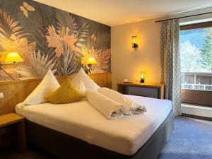 Postel nebo postele na pokoji v ubytování Hotel Dr Otto Murr B&B + 37 fotografií