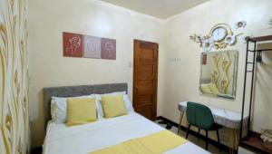 Postel nebo postele na pokoji v ubytování Serdena Homestay Fronting Cuatro Islas