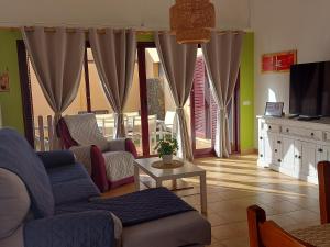 TV a/nebo společenská místnost v ubytování villa Mimosa