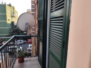 a balcony with a view of a street at Casa Ludovica Centocelle in Rome