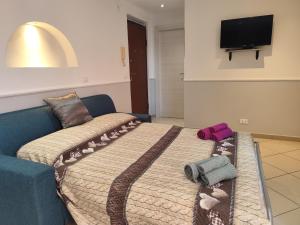 a bed with two pillows on it in a room at Casa Ludovica Centocelle in Rome
