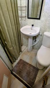 Koupelna v ubytování Serdena Homestay Fronting Cuatro Islas