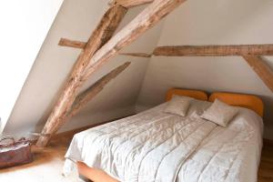 מיטה או מיטות בחדר ב-Lozerkasteel