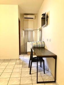 a dining room with a table and a chair at Bravo Inn Hotel Coxim in Coxim +12 photos