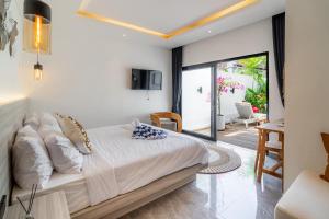 TV a/nebo společenská místnost v ubytování Luxury Villa 2br In Canggu