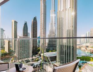 a view of a city skyline with tall buildings at Stylish Downtown Retreat, Burj Crown, Opera & Boulevard View in Dubai
