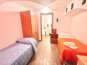 Posteľ alebo postele v izbe v ubytovaní Catania Central Flat