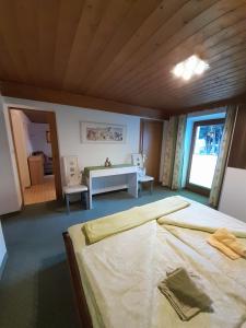 Postel nebo postele na pokoji v ubytování Apart Pöll