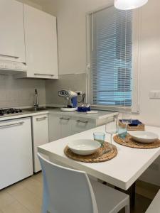 Η κουζίνα ή μικρή κουζίνα στο Coccola a due passi dal mare