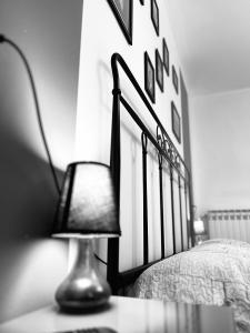 Postel nebo postele na pokoji v ubytování B&B Comacchio