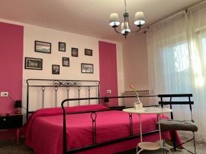 Postel nebo postele na pokoji v ubytování B&B Comacchio